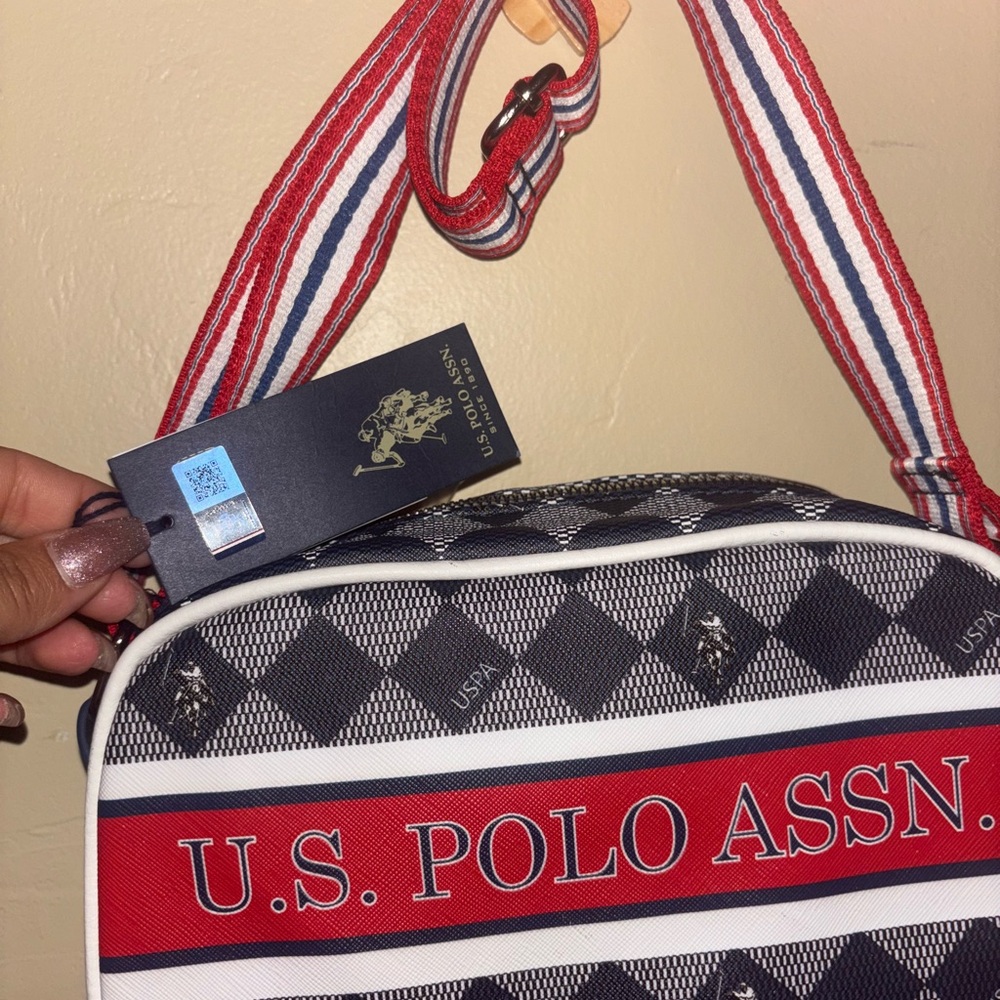 U.S. Polo Assn. Black and Red Duffel Bag with Sporty Design